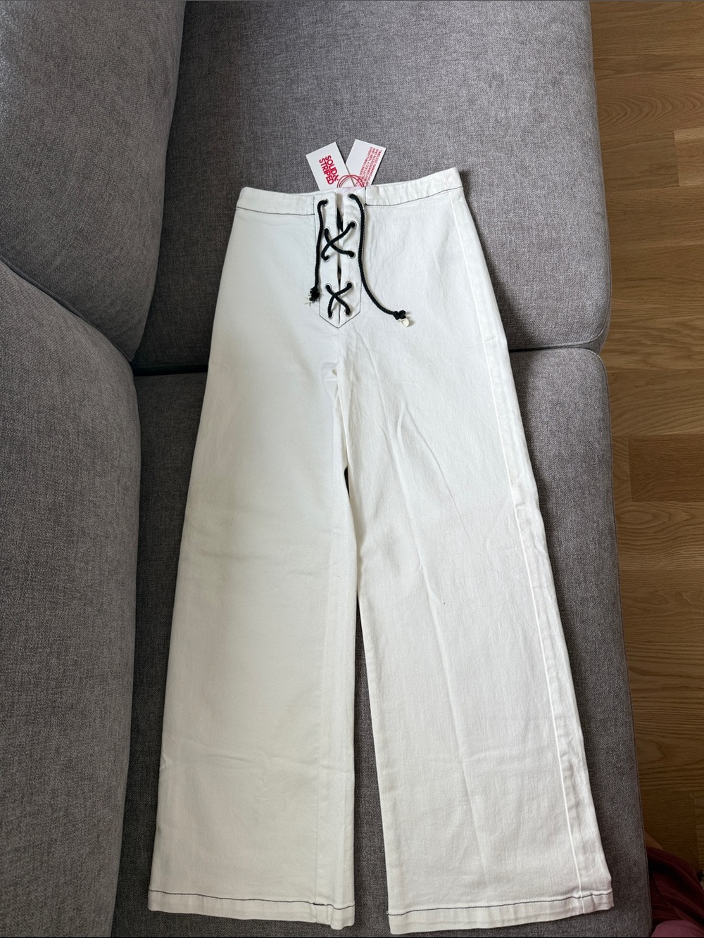 Solid and Striped White Wide-Leg Denim Pants with Black Lace-Up Waist